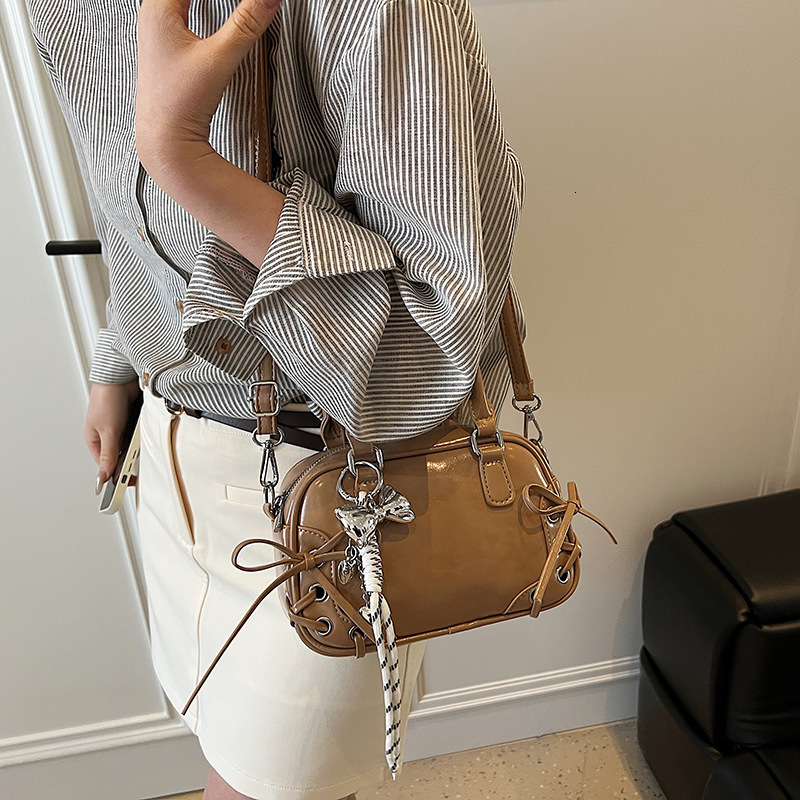 designer Niche Design Sweet Cool Style Bowknot Boston Bag for Women 2025 New Textured Commuter Versatile Shoulder Underarm Bag