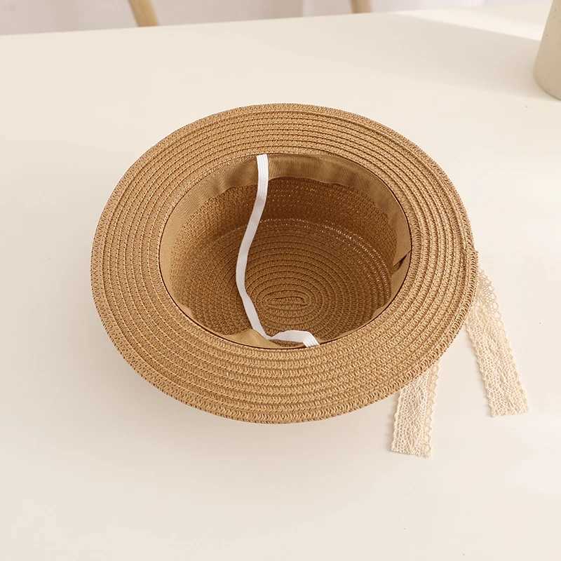 New Child Summer Sun Hat Bucket Cap Simple Beige Lace Bowknot Ribbon Flat Top Straw Hat Beach Outing Caps Panama W250602