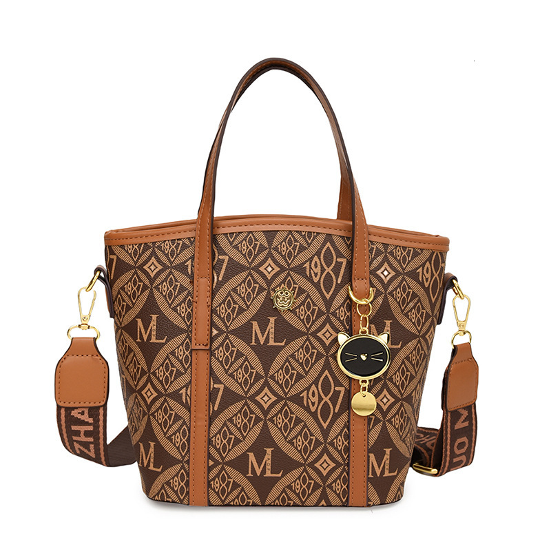 High Quality New Free Designer Bag 2024 Summer New Cat Print Bucket Fashionable Commuting Multifunctional Single Shoulder Crossbody Bag
