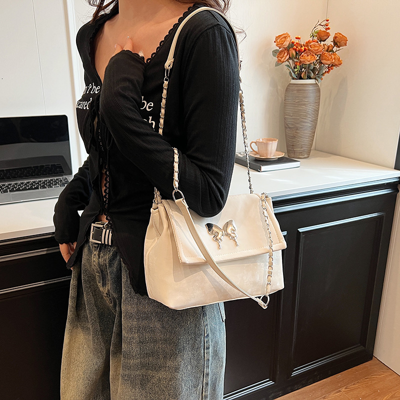 Top brand high-quality new free designer bag 2025 new fashionable embroidered chain armpit shoulder bag simple and fashionable crossbody bag new free 