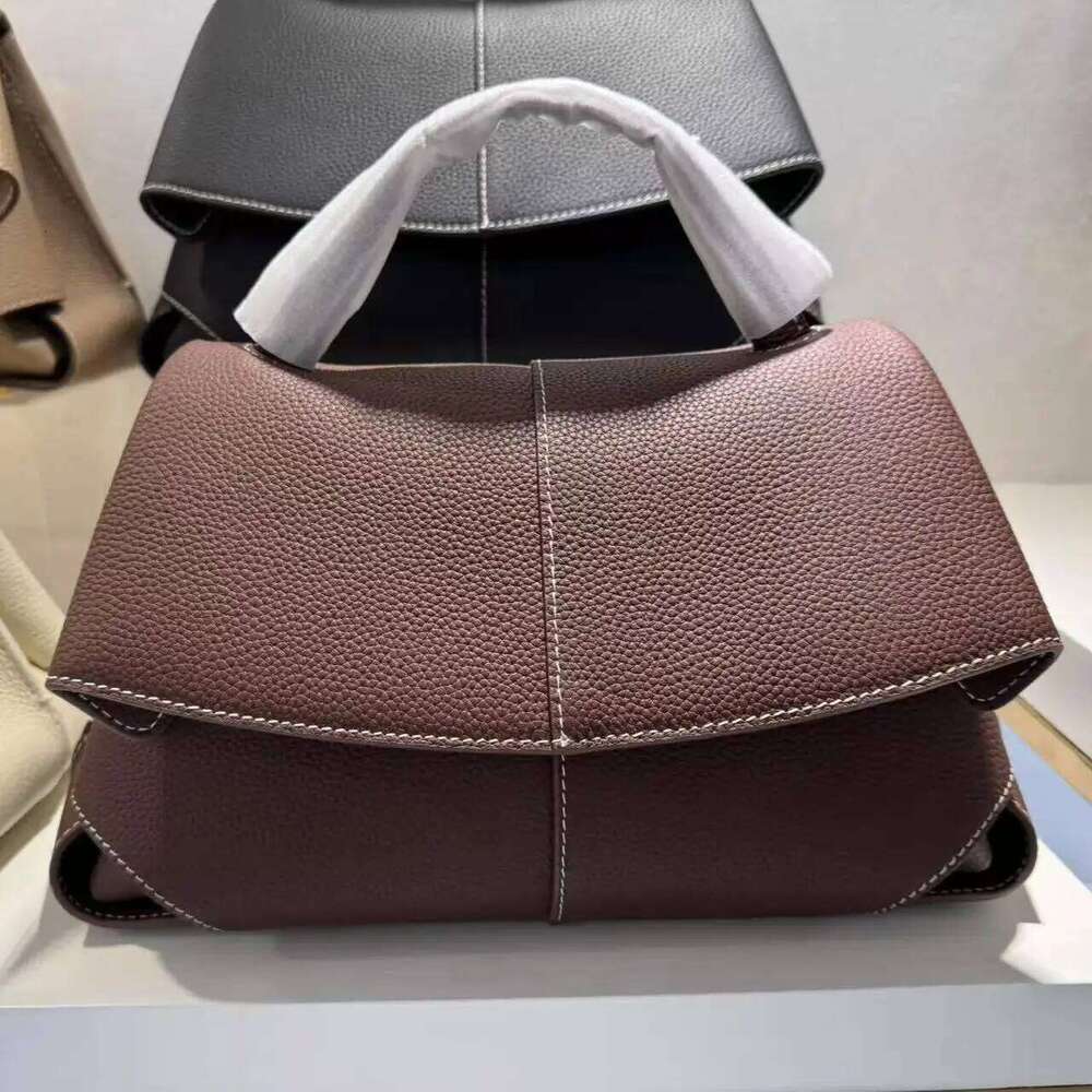 High end leather smile bag with pleated design, single shoulder large capacity commuting handbag