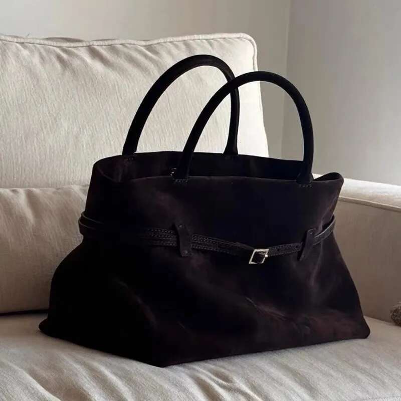 Fashionable new suede women's arrow shoulder hand-held tote bag