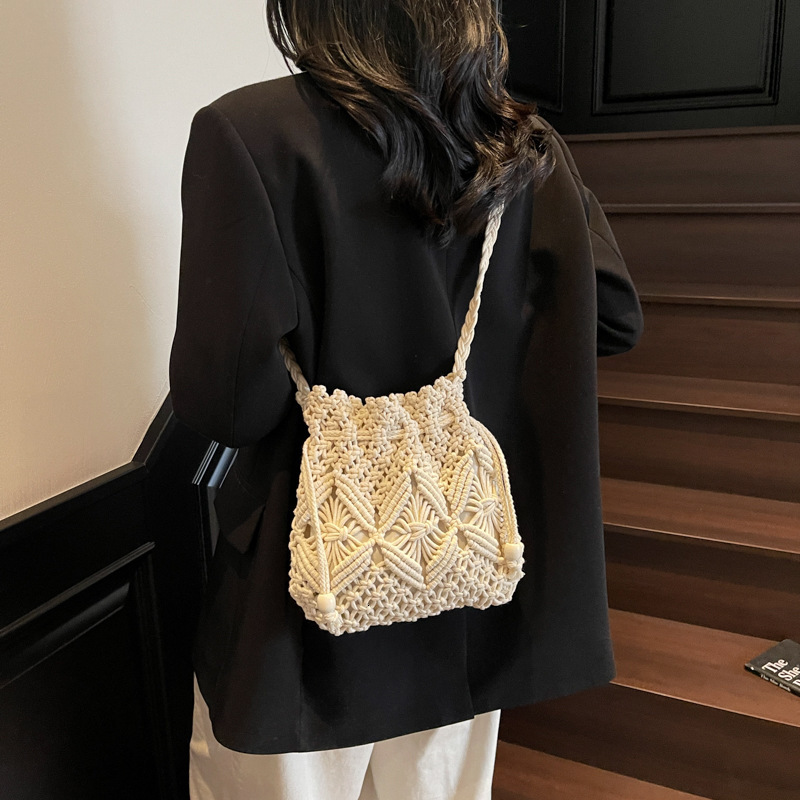 designer Woven Cotton Rope Bag for Women Summer Versatile 2025 New Fashion Niche Design Crossbody Bucket Bag Hollow Beach Bag