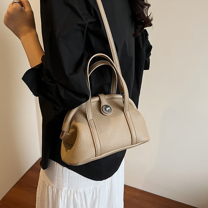 designer casual bag 2025 New High-End Handheld Boston Bag for Women Versatile Bowling Bag Single Shoulder Crossbody Shell Bag