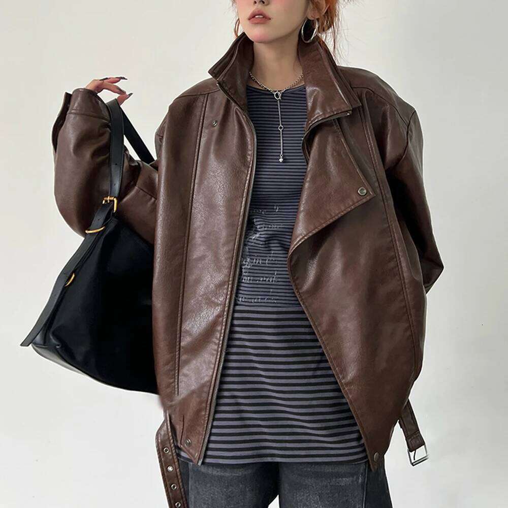 TWOTWINSTYLE Solid Spliced Zipper Loose Leather Jackets For Women Lapel Long Sleeve Patchwork Pockets Female Fashion Style New