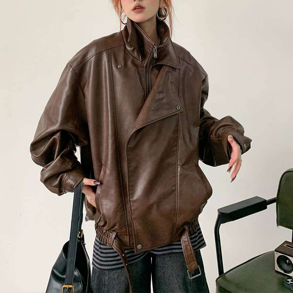 TWOTWINSTYLE Solid Spliced Zipper Loose Leather Jackets For Women Lapel Long Sleeve Patchwork Pockets Female Fashion Style New