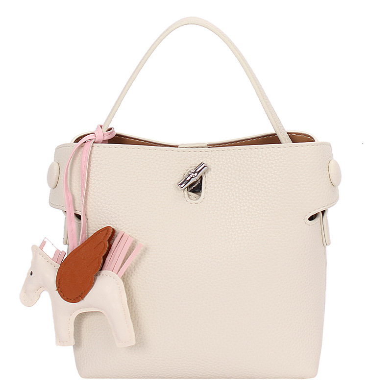 designer Minimalist Casual Lychee Texture Handheld Bucket Bag for Women 2025 New Versatile Fashion Crossbody Bag with High-end Feel Handbag