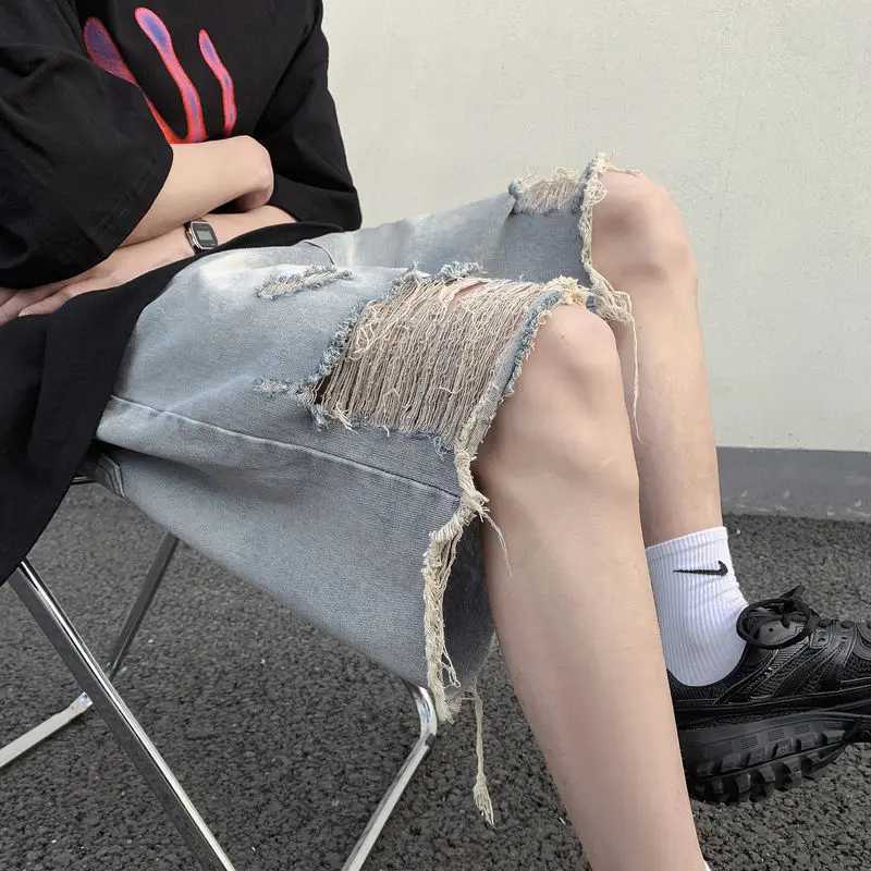Mens Loose Wide-leg Retro Beggar Five-point Ripped Denim Shorts T250603