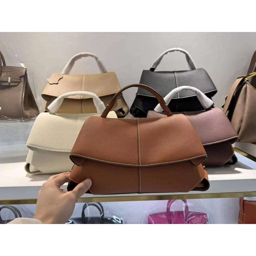High end leather smile bag with pleated design, single shoulder large capacity commuting handbag