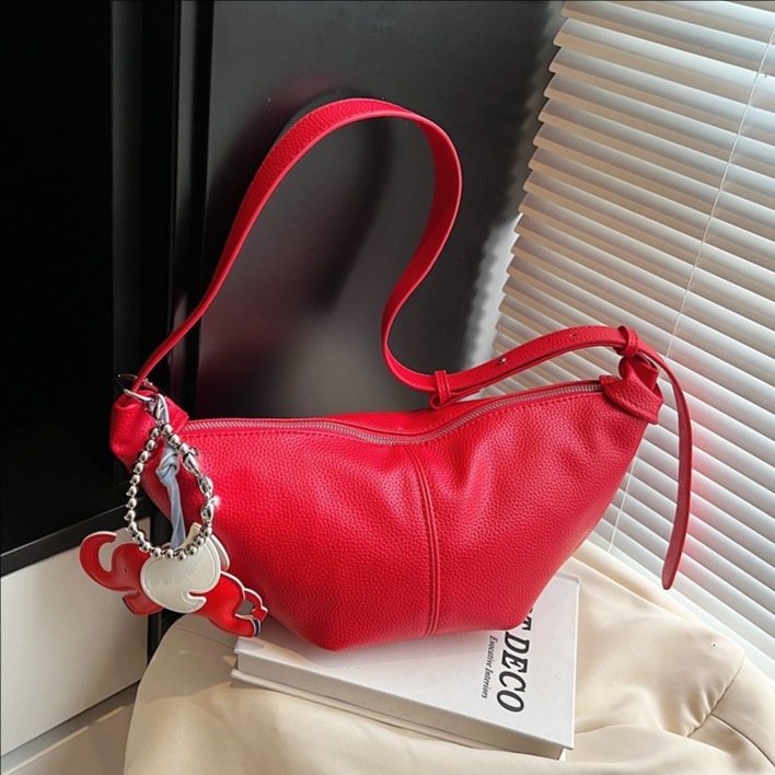 designer Delicate and Exquisite High-End Soft Leather Dumpling Bag for Women 2025 New Lightweight Niche Design Solid Color Single Shoulder Crossbody B