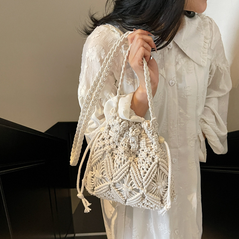 designer Woven Cotton Rope Bag for Women Summer Versatile 2025 New Fashion Niche Design Crossbody Bucket Bag Hollow Beach Bag