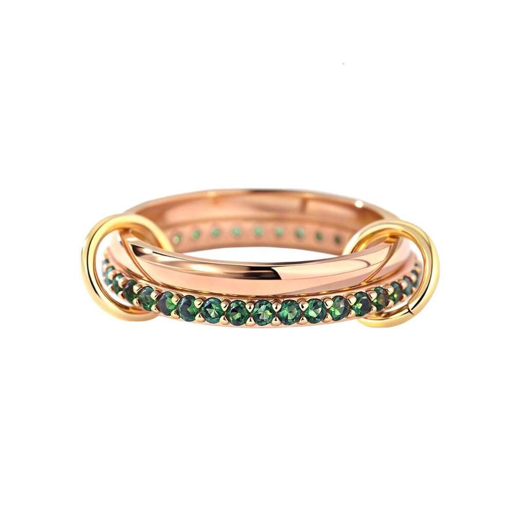 goldplated copper interlocking stacking rings inlaid with green cubic zirconia jewelry