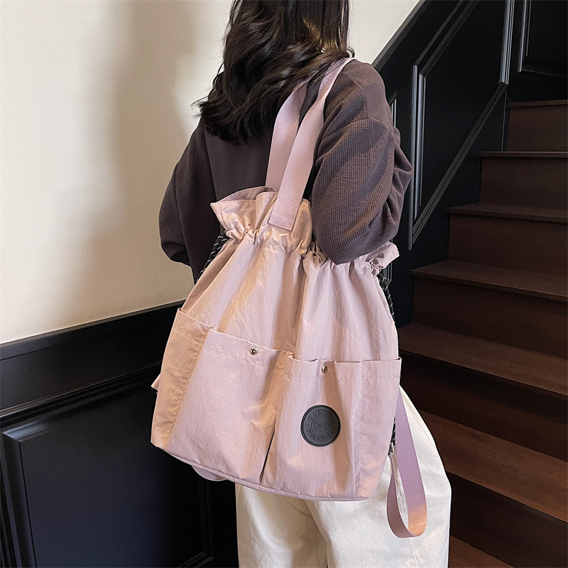 Lightweight Backpack for Women, New Drawstring Pocket Travel Bag, College Student Backpack, Casual Handheld and Crossbody Bag
