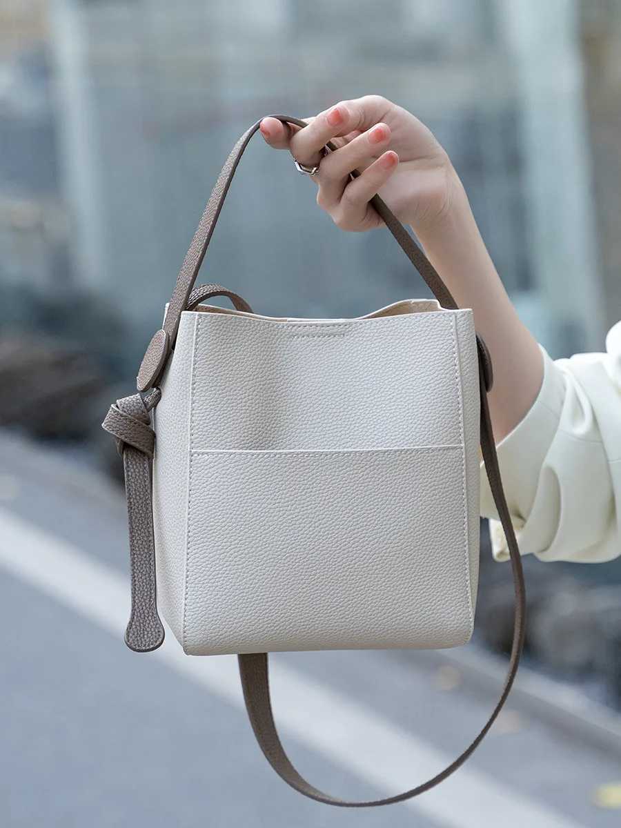 Genuine Leather Womens Crossbody Bag Handbag 2025 new large capacity commuter bucket bag Luxury versatile Cowhide shoulder bag W250602