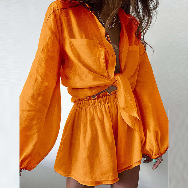 European and American solid color ruffled shorts shirt women's two-piece set 2025 new casual versatile fashion clothing