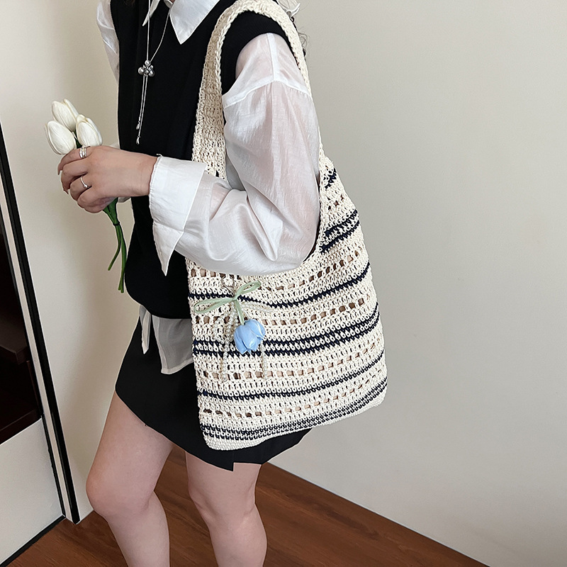 designer Niche Design Handwoven Bag 2025 New Striped Cotton Rope Women's Bag Trendy Hollow Handbag Shoulder Beach Bag