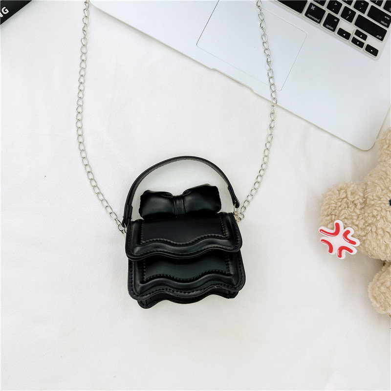 Top brand high-quality new free designer bag fresh children's bag crossbody bag 2025 new butterfly bow fashion mini fashion girl handbag, new fre