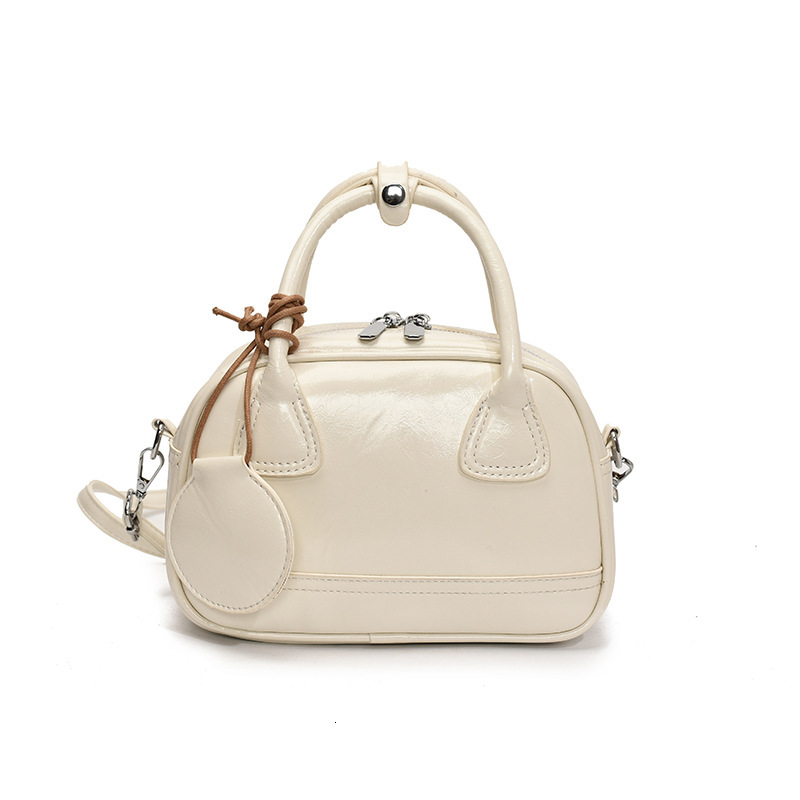 designer casual bag 2025 New Niche Retro Handbag Shell Bag Versatile Pillow Bag Vintage High-end Single Shoulder Crossbody Bag