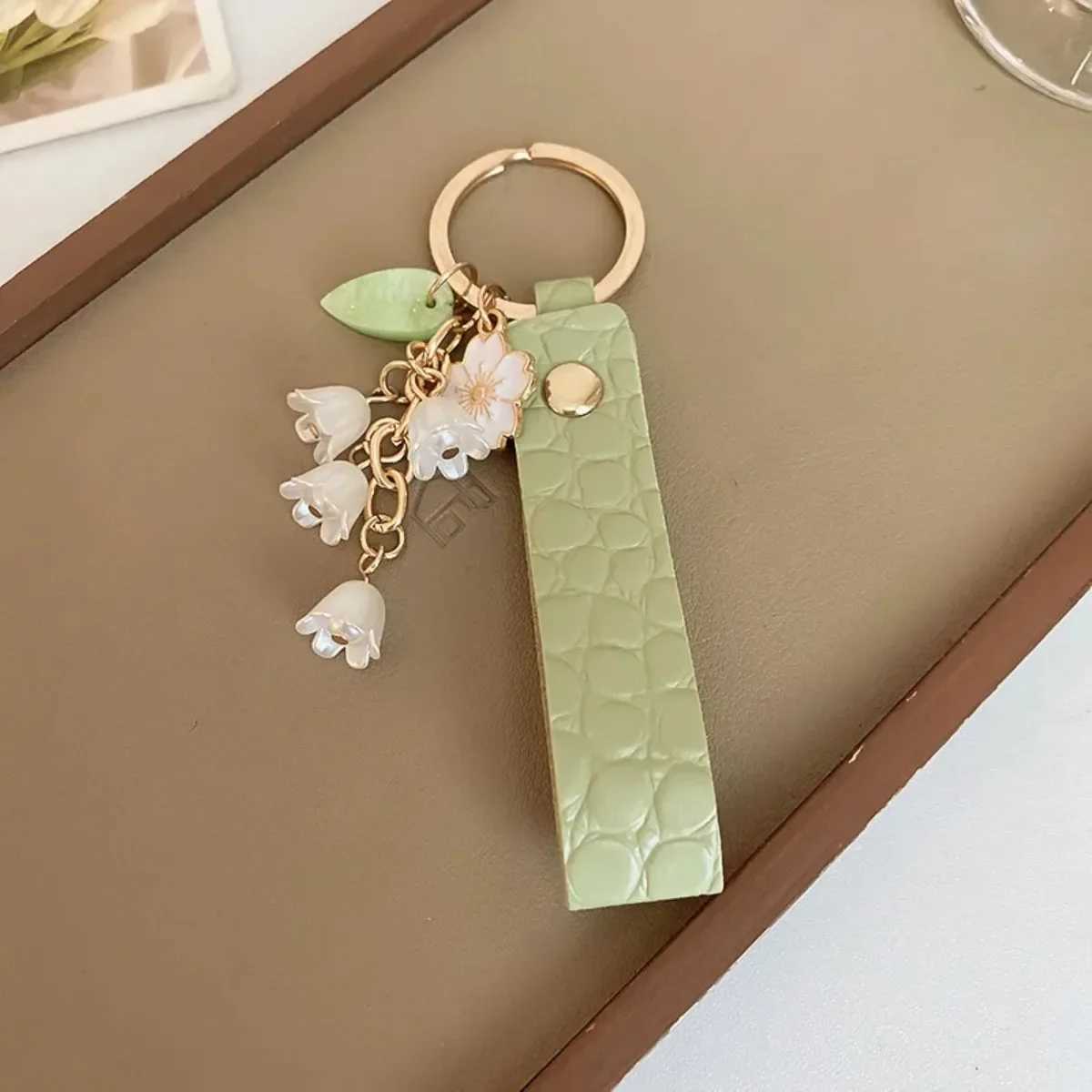 Womens Green Fairycore Keychain with Lily of the Valley Flower Sweet Leather Korean Style Fashion Accessory XJ250602