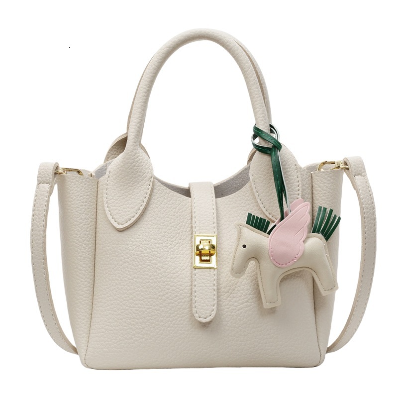 designer 2025 New Stylish Solid Color Versatile Handheld Bucket Bag for Women Korean Version Casual Simple Commuter Shoulder Crossbody Bag