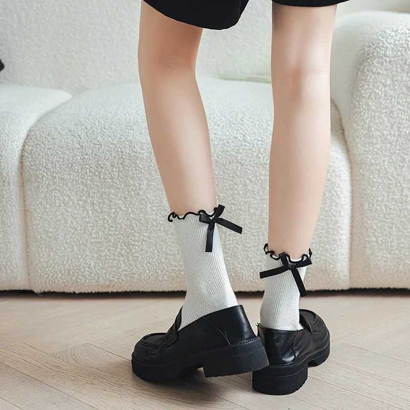 Japanese JK Sweet Bowknot Tied Middle Tube Socks Women Heel Bow Casual Black White Pile Socks Girls Sports Cotton Socks T250602