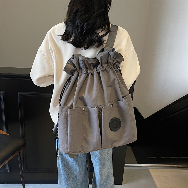 Lightweight Backpack for Women, New Drawstring Pocket Travel Bag, College Student Backpack, Casual Handheld and Crossbody Bag