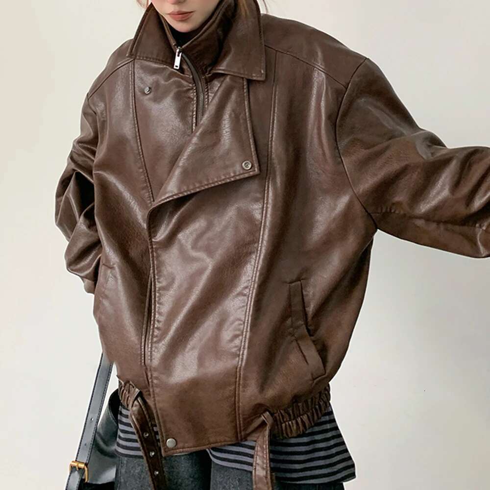 TWOTWINSTYLE Solid Spliced Zipper Loose Leather Jackets For Women Lapel Long Sleeve Patchwork Pockets Female Fashion Style New