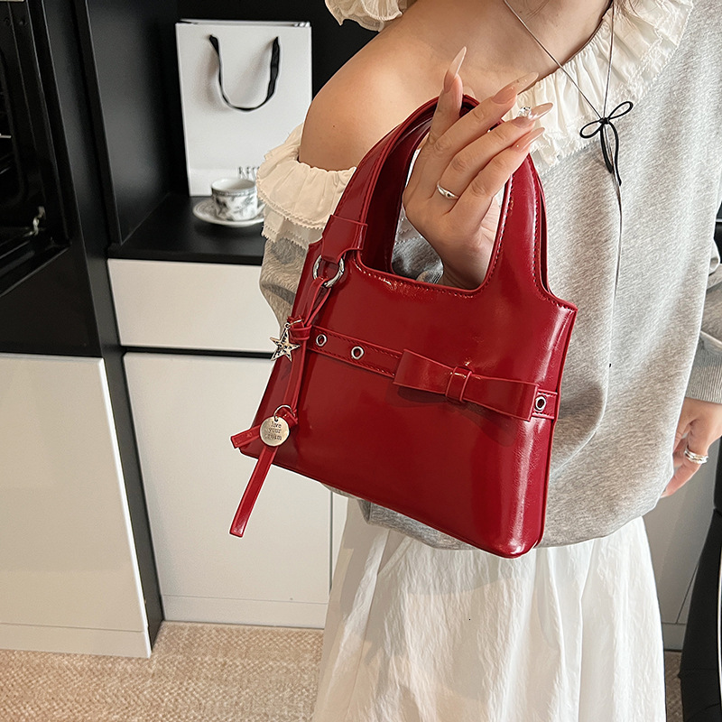 designer 2025 New Korean Style High-End Bowknot Handbag Fashionable Luxurious Versatile Commuter Shoulder Crossbody Bag