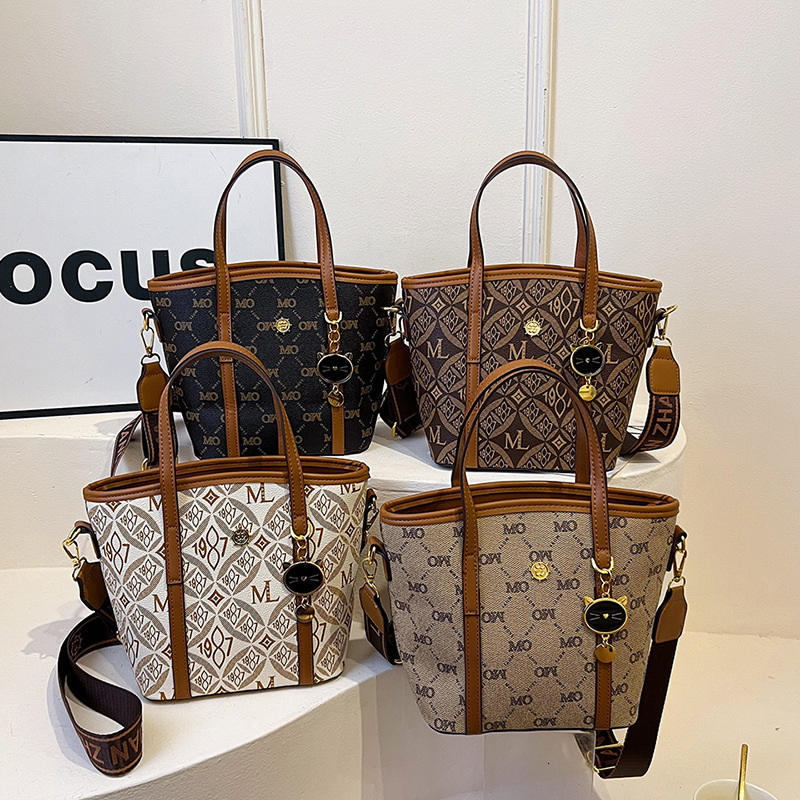 High Quality New Free Designer Bag 2024 Summer New Cat Print Bucket Fashionable Commuting Multifunctional Single Shoulder Crossbody Bag