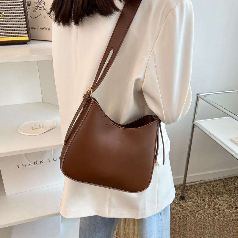 High quality brand new high-quality free designer bag cross-border new texture bucket bag slanted shoulder bag fashionable and simple handbag new free