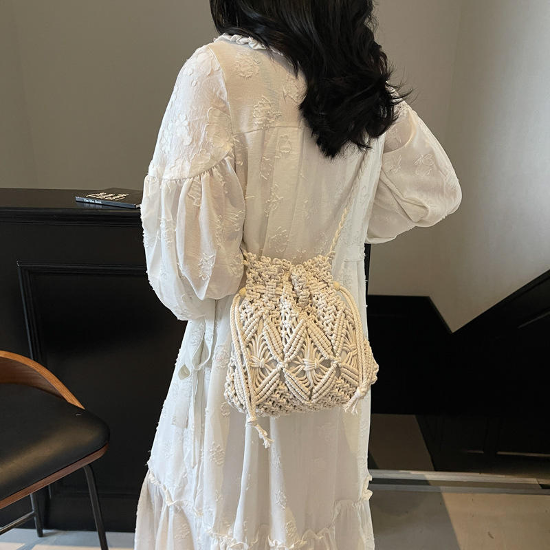 designer Woven Cotton Rope Bag for Women Summer Versatile 2025 New Fashion Niche Design Crossbody Bucket Bag Hollow Beach Bag