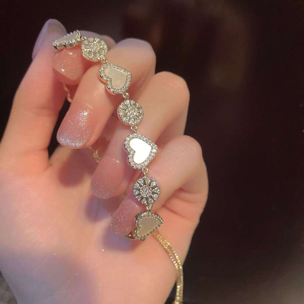 INS hot Titanium steel 18K gold electroplated zircon sun heart splicing bracelet Korean style light luxury style pull-out bracelet fashionable persona