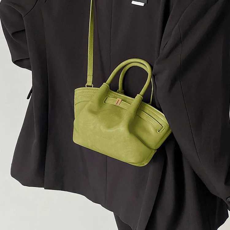 2025 Spring New Oil Wax Leather Casual Dumpling Bag Womens Fresh Pleated Commuters All-Matching Portable Messenger Bag W250602