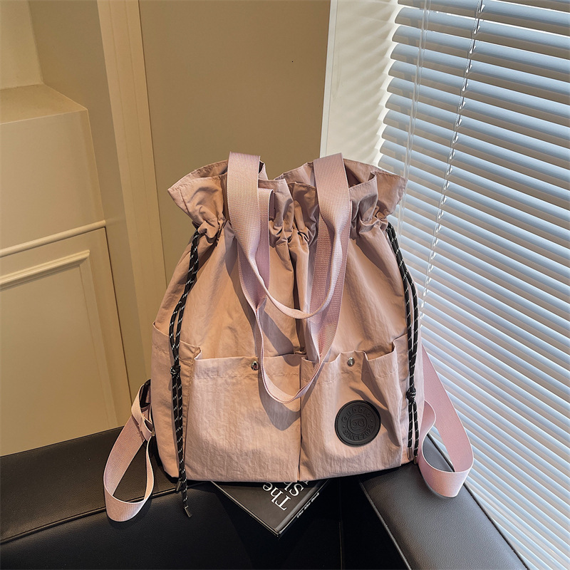 Lightweight Backpack for Women, New Drawstring Pocket Travel Bag, College Student Backpack, Casual Handheld and Crossbody Bag