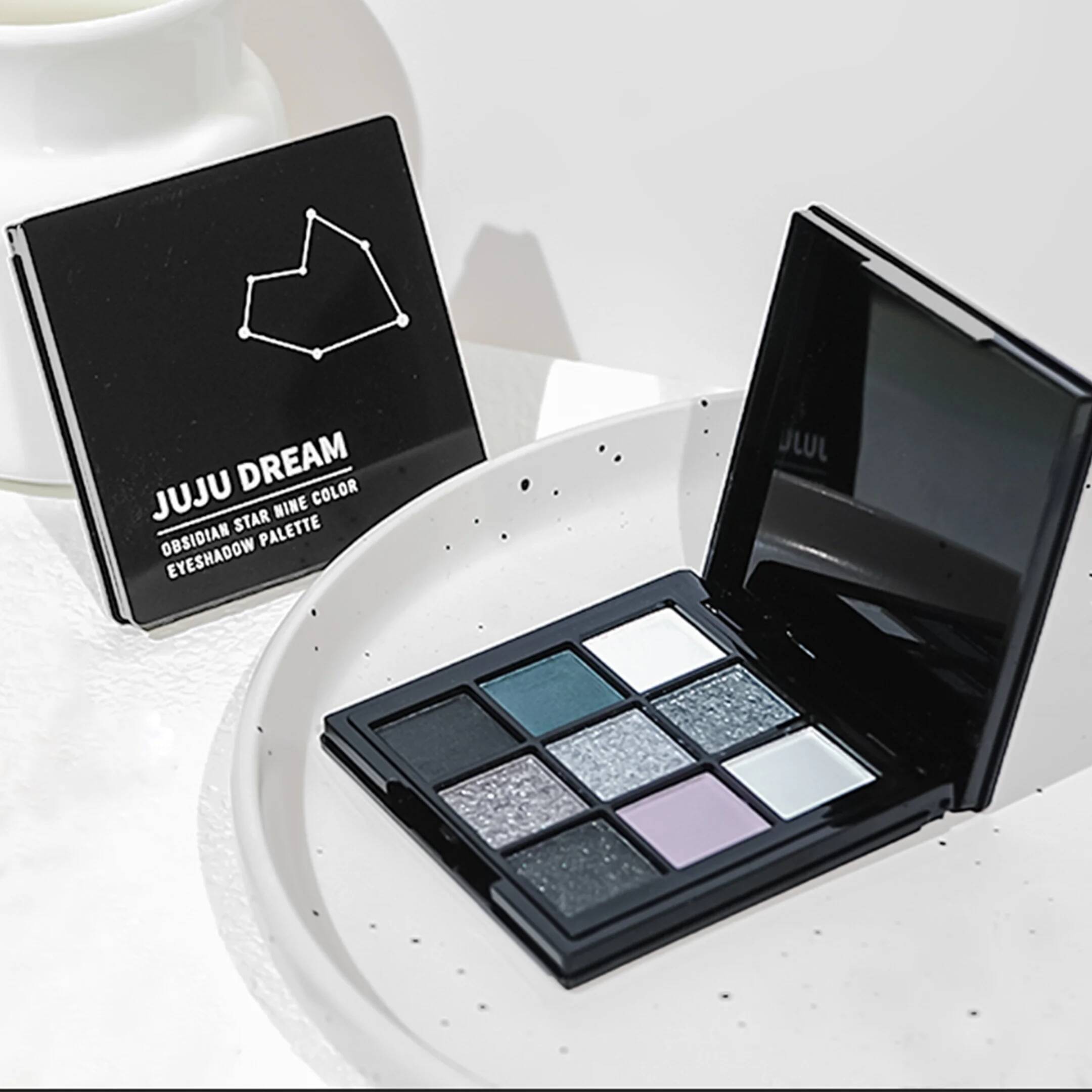 9-shade eyeshadow palette: Black Swan, Smoky, Dark Black, Grey Sier Glitter, Matte Finish, Long-lasting, and easy to color