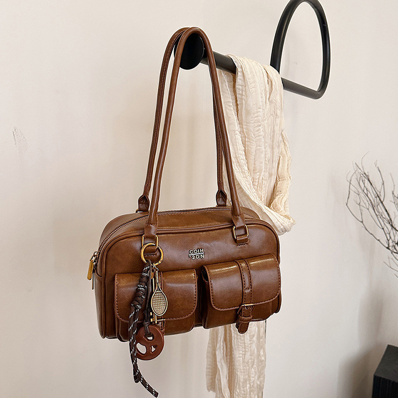 Top brand high-quality new free designer bag high-end retro large capacity bag 2025 new fashionable bowling bag one shoulder armpit handbag new free d