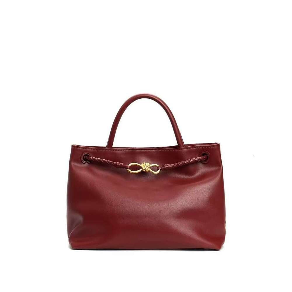 New Andiamo Bowknot Full Cowhide Classic Woven Commuter Large Capacity Tote Handbag