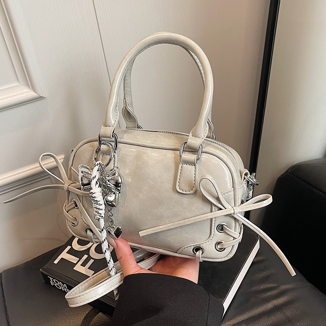 designer Niche Design Sweet Cool Style Bowknot Boston Bag for Women 2025 New Textured Commuter Versatile Shoulder Underarm Bag