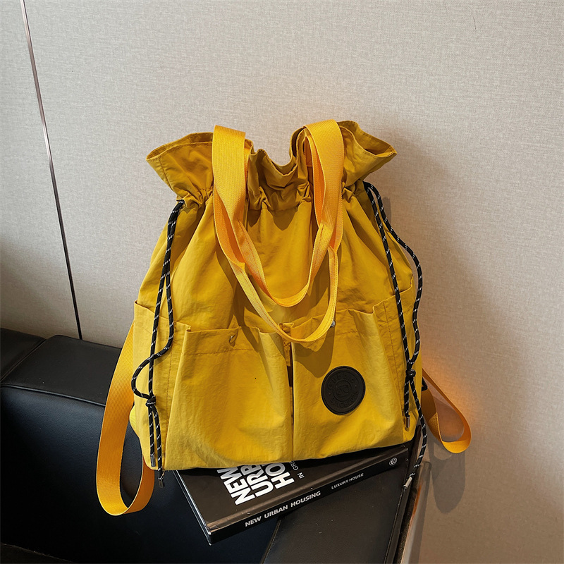Lightweight Backpack for Women, New Drawstring Pocket Travel Bag, College Student Backpack, Casual Handheld and Crossbody Bag