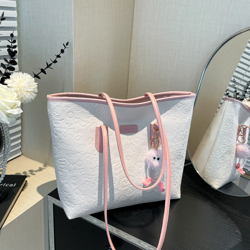 Top brand high-quality new free designer bag cute embossed large capacity handbag 2025 fashion trend multifunctional color block shoulder bag new free