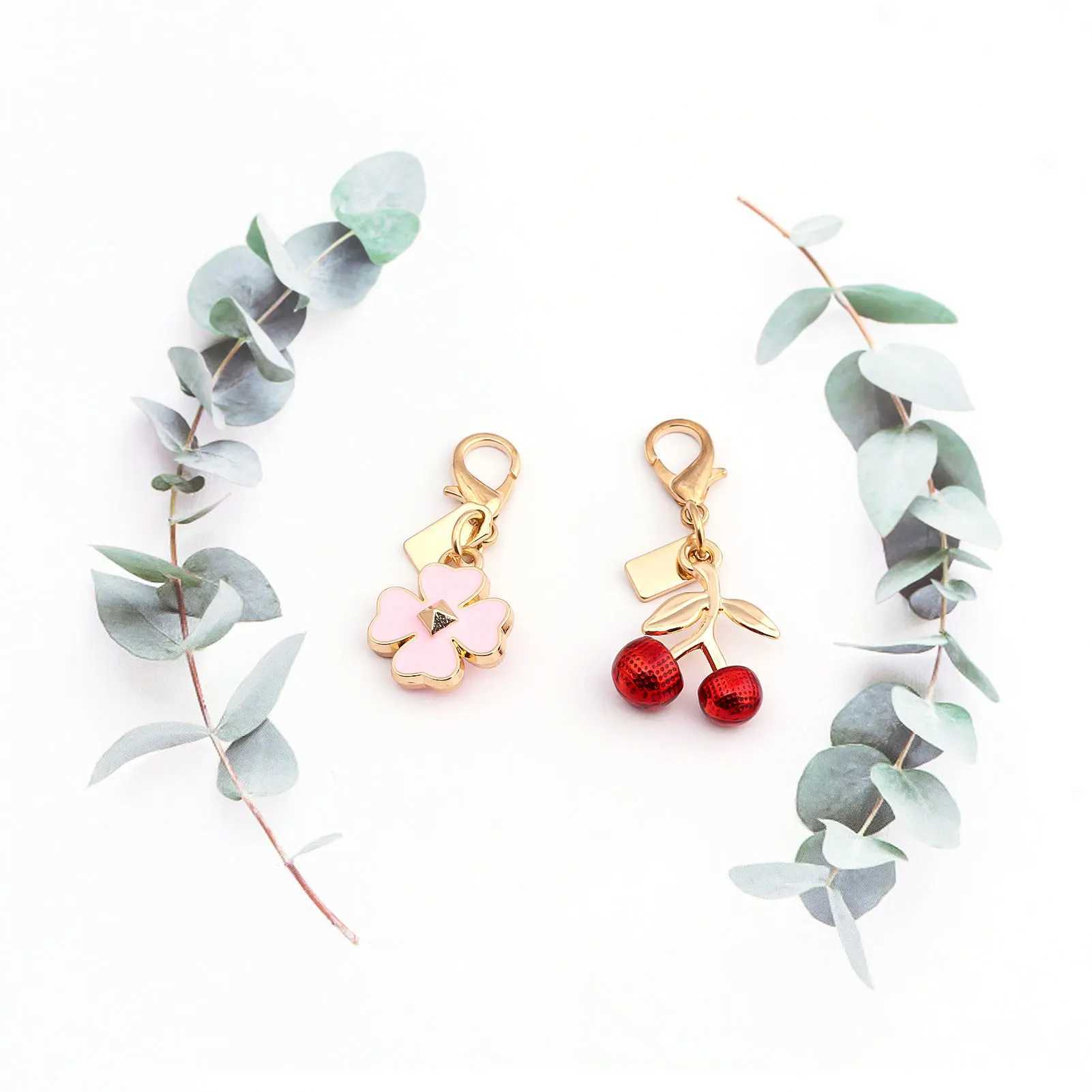 Exquisite High End Bear Cherry Butterfly Flower Bag Charms Keychains For Women Bag Fashion Charms Pendant Keychain Jewelry Gift XJ250602