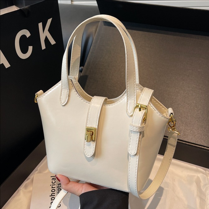 designer Korean Solid Color Large Capacity Handheld Bucket Bag for Women 2025 New Versatile Simple Crossbody Bag Casual Commuter Shoulder Bag