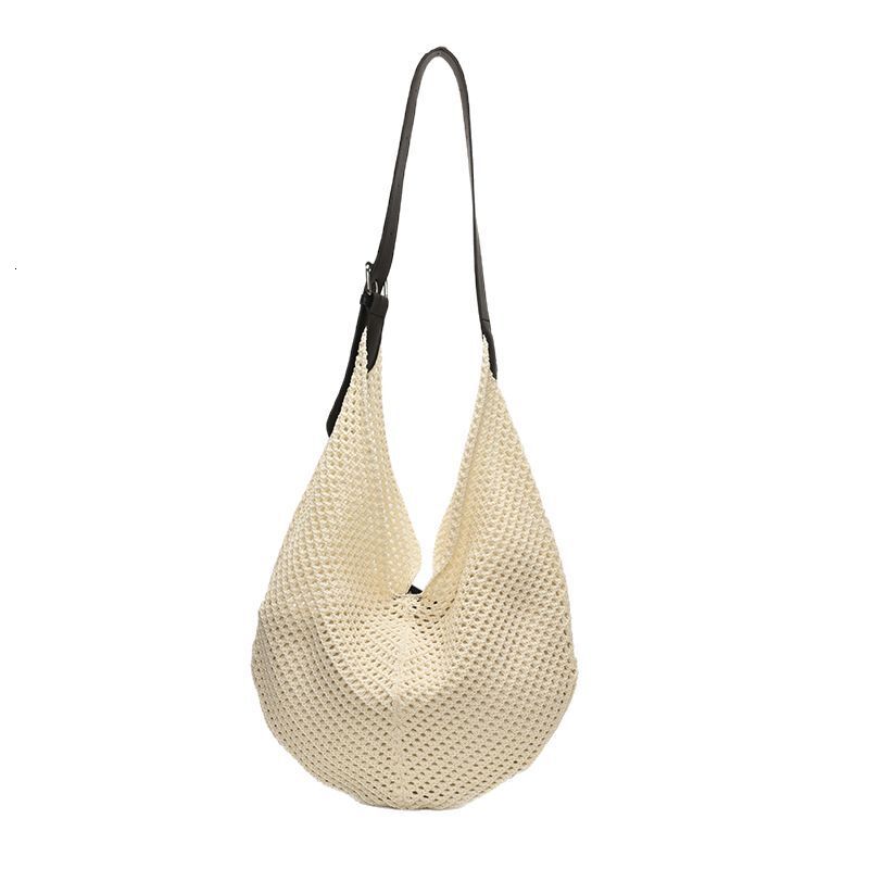 designer 2025 New Niche Ins Hollow Out Patchwork Woven Bag Summer Casual Beach Vacation Shoulder Underarm Bag