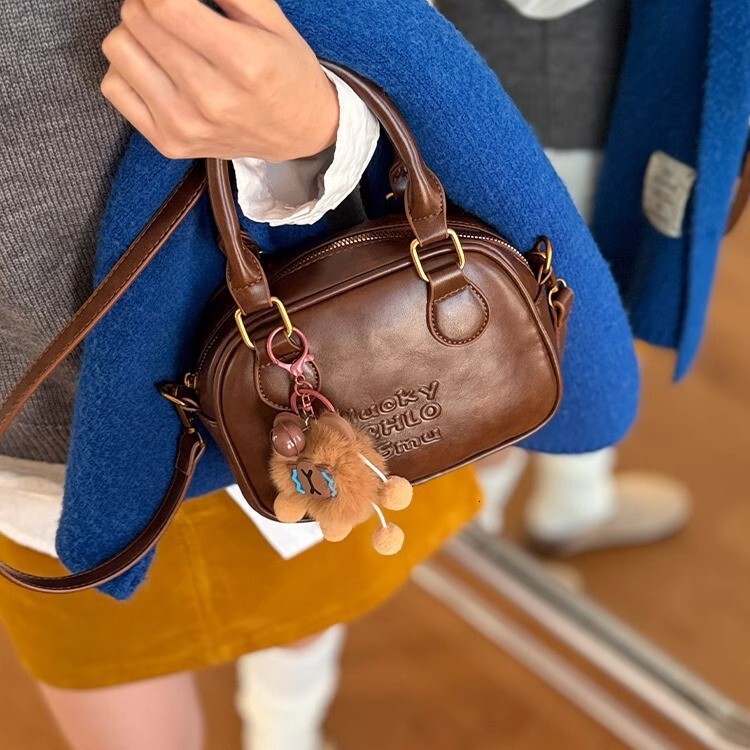 Vintage women s bowling bag spring and summer shoulder crossbody bag coffee fashion colored handbag fashion designer women s shoulder bag