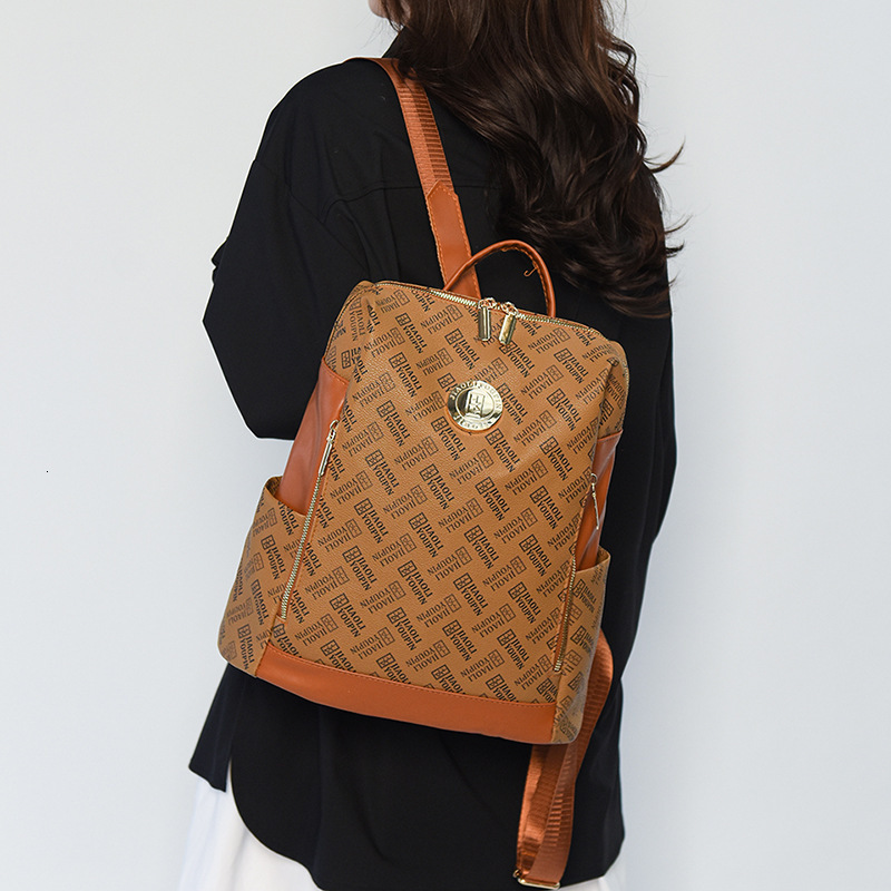 Free Shipping Outdoors Backpack Designer Bag Fashion Printed Letter Bag Round Buckle Retro Casual Crossbody Shoulder Bag PU Student School Bag