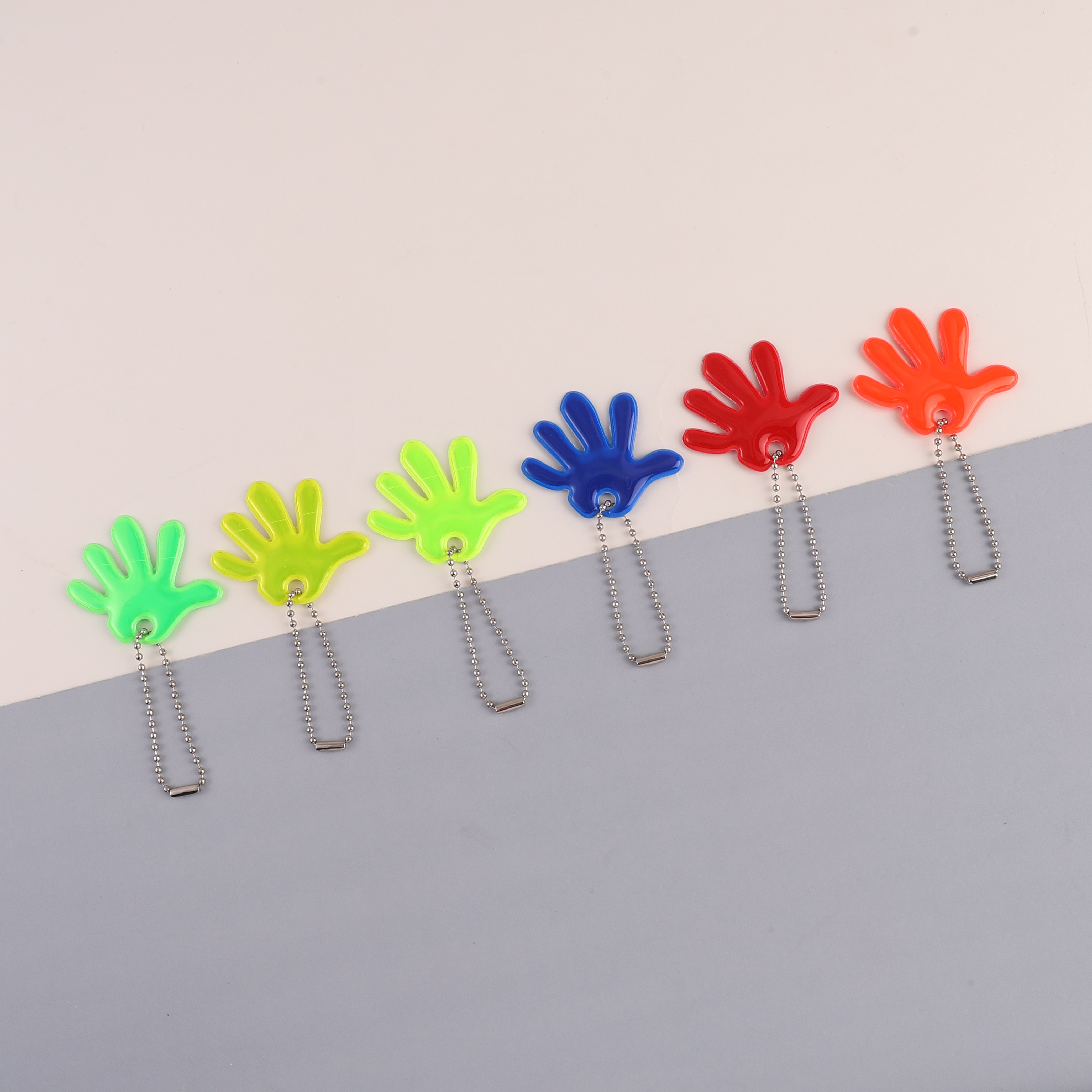 Minimalist Design Hand Shape Backlighting Keychain Perfect for Safe Outdoor Activities at Nighttime, Customizable Wholesale Options