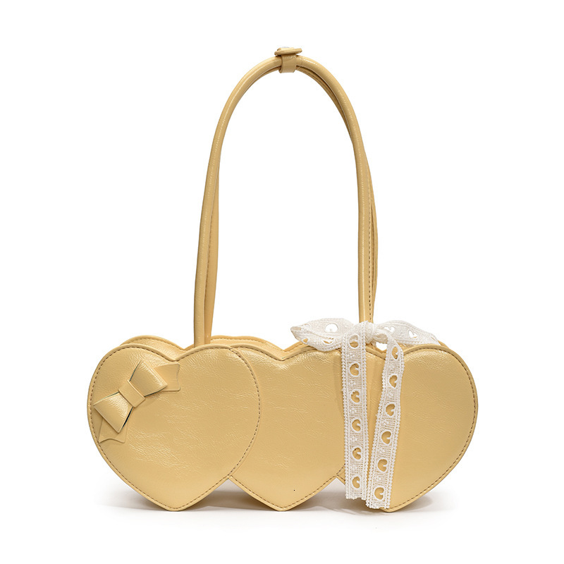 2025 New Niche Heart Bag Women Long Handbag Versatile Baguette Shopping Bag Designer Bag Spring Summer Free Shipping New Fashion Single Shoulder Bag