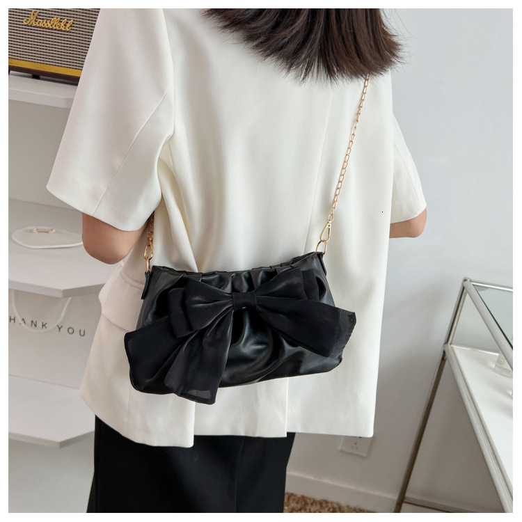 High quality brand new high-quality free designer bag bow tie new chain shoulder and armpit bag multifunctional pleated sloping body brand new free de