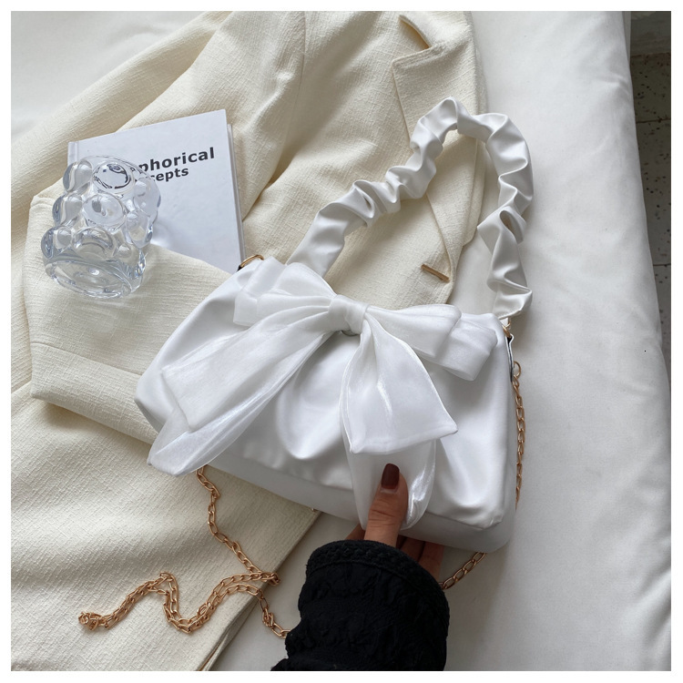 High quality brand new high-quality free designer bag bow tie new chain shoulder and armpit bag multifunctional pleated sloping body brand new free de