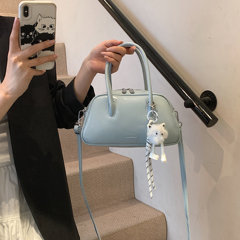 designer Korean Style Simple Handheld Bowling Ball Bag for Women 2025 New Casual Crossbody Bag Niche Commuter Shoulder Pillow Bag